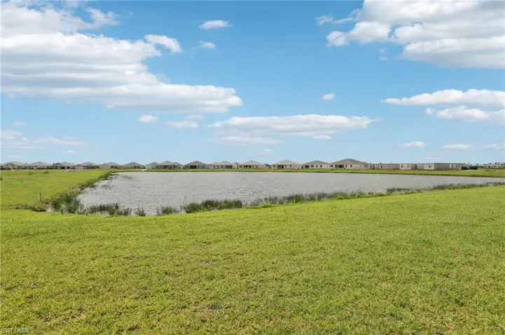 Water view with nearby suburban area