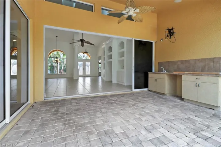 View of patio / terrace with ceiling fan and french doors