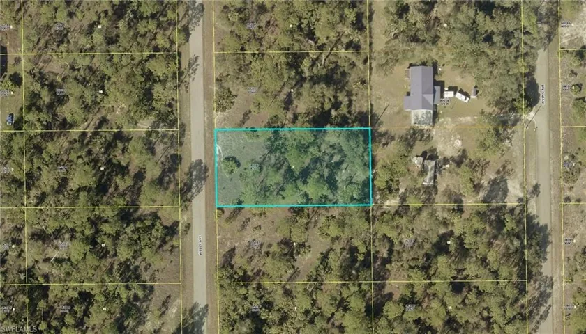 Aerial overview of property's location with property parcel outlined