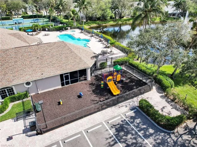 Bird's eye view of a pool area and a large body of water
