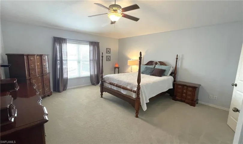 Spacious Primary Suite with Vaulted Ceiling and Lakeviews