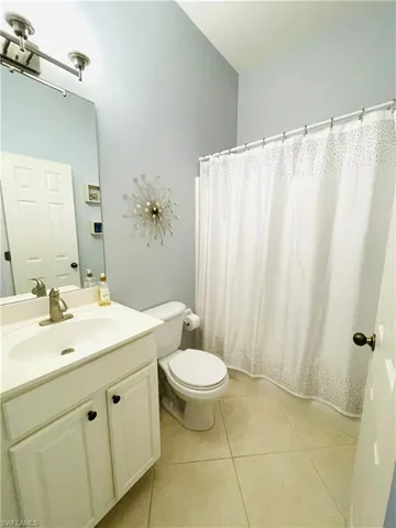 Full Bath in Separate Hallway off Kitchen next to Front Bedroom/Office
