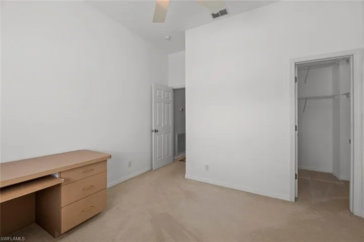Front Bedroom/Office with Walk-in Closet and High Ceilings