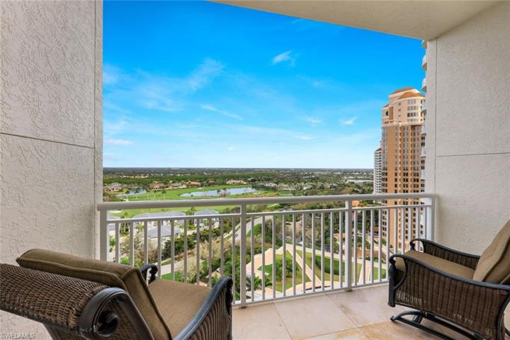 Views of walking paths, golf course, Bonita Bay lakes and Bonita Springs in the distance.