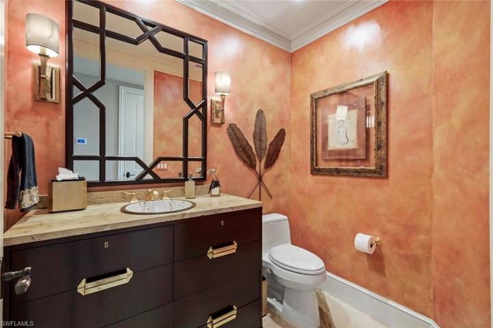 Lovely powder room located next to formal living room.