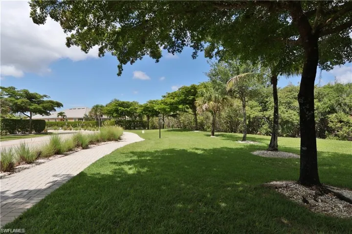 View of home's community featuring a lawn