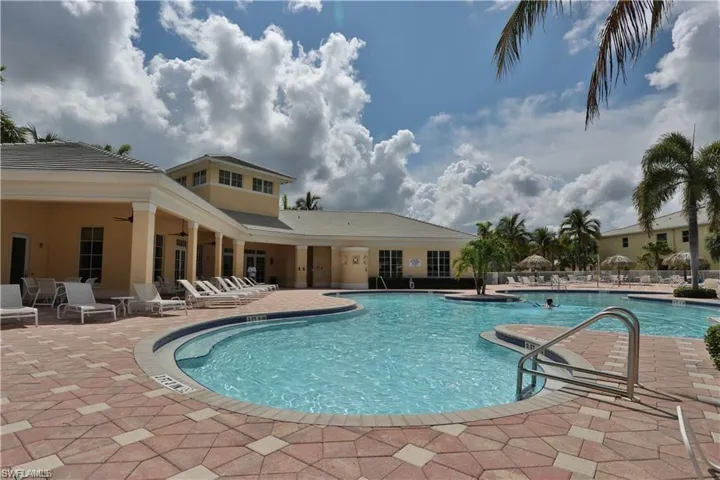 View of swimming pool with a patio and ceiling fan