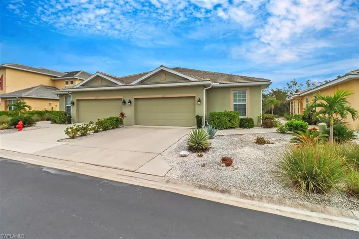 View of front of property with a garage
