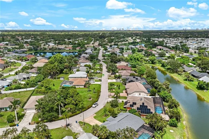 This home backs to water but has a beautifully landscaped yard for privacy.