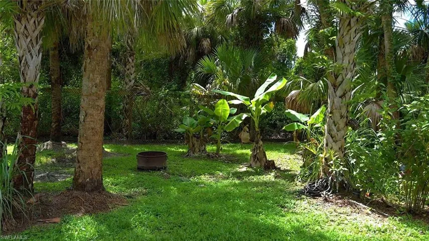View of yard featuring a fire pit