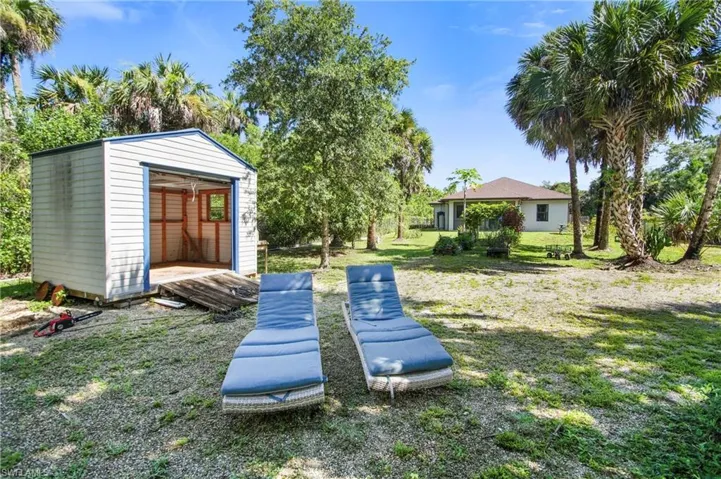 View of yard with a shed