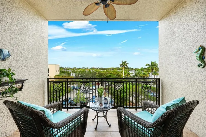 Balcony featuring ceiling fan
