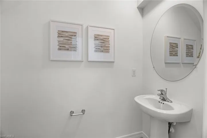 Bathroom featuring baseboards