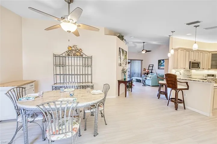 Dining area with ceiling fan