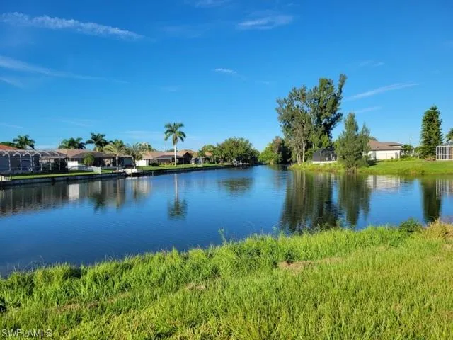 Water view with nearby suburban area