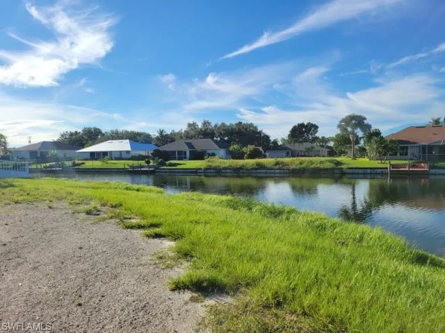 Water view with nearby suburban area