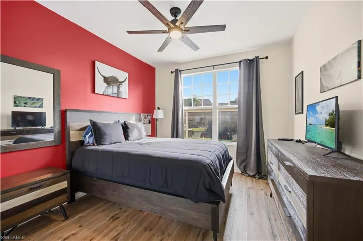 Bedroom featuring light wood-style flooring and ceiling fan
