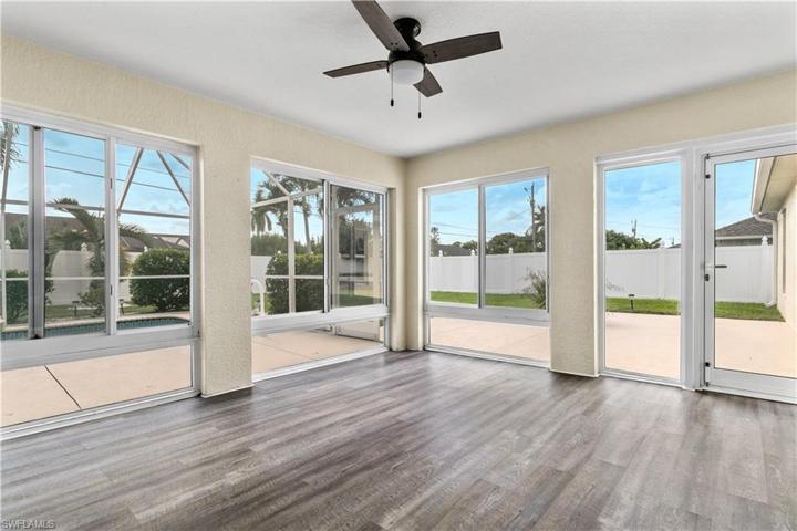 Sunroom with impact windows and door.