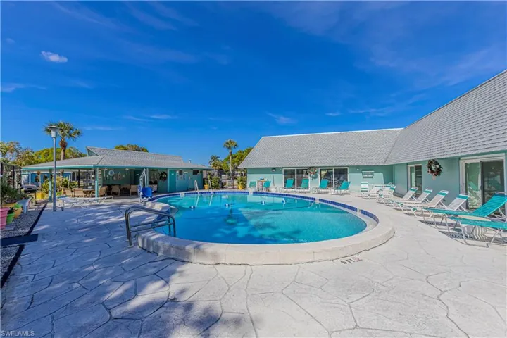 View of swimming pool with a patio area