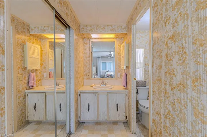 Bathroom with vanity and toilet