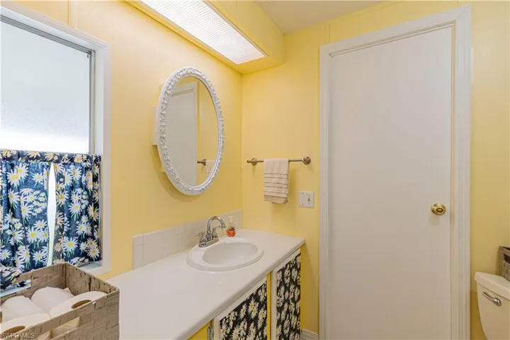 Bathroom featuring toilet and sink
