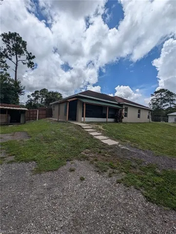 View of front facade with stucco siding