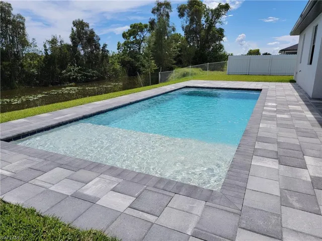 View of pool with a patio area