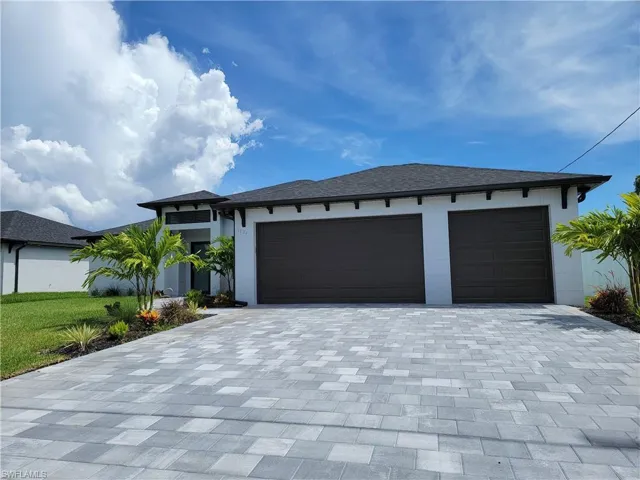 View of front of home with a garage
