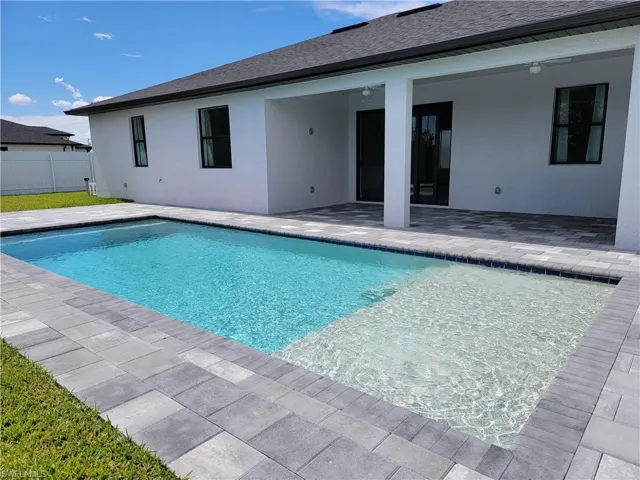 View of pool with a patio area