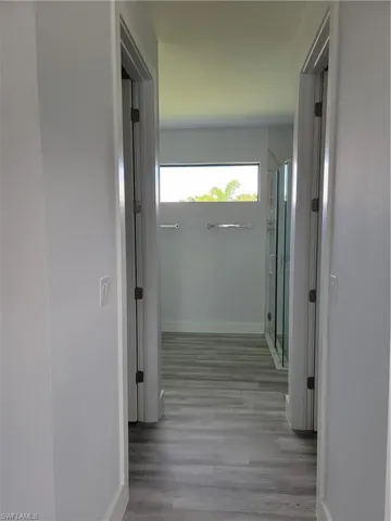 Hallway featuring light hardwood / wood-style floors