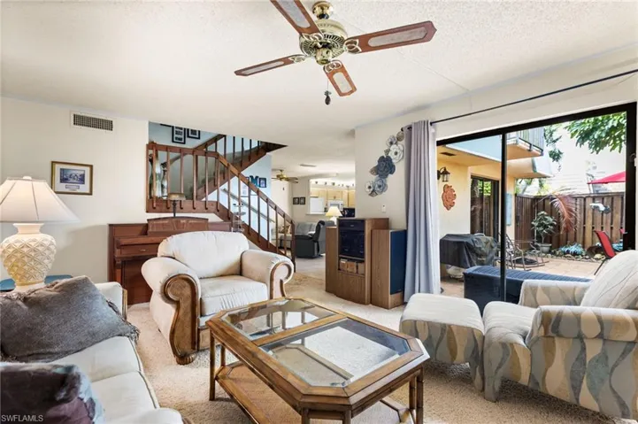 Family room with slider leading to patio.