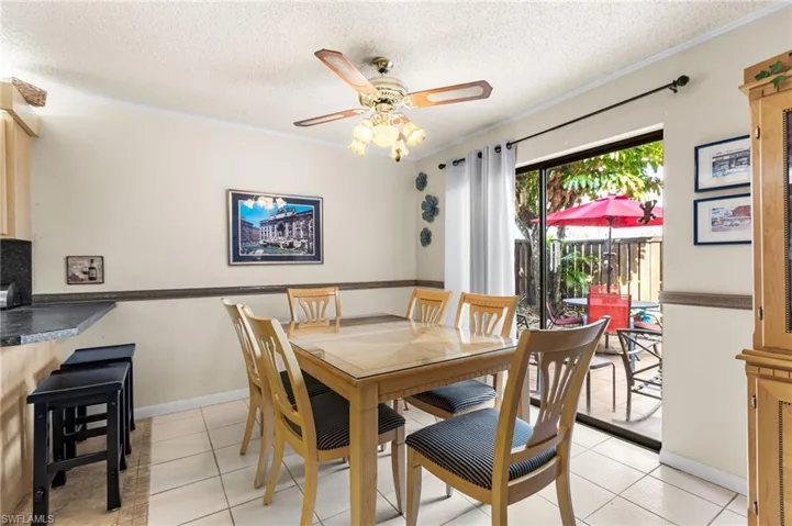 Dining room with door to patio area.