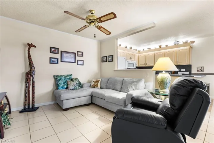 Living room adjacent to kitchen.