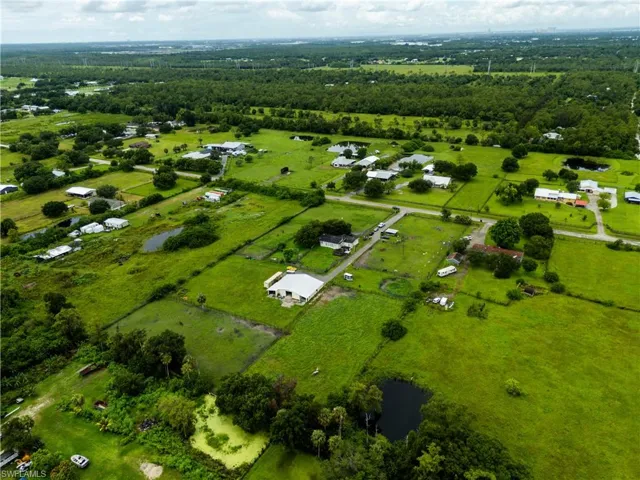 Overview of rural landscape with a nearby body of water