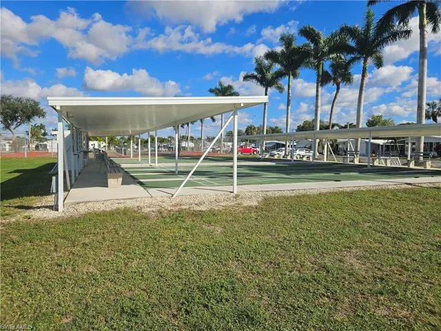 View of community with a yard