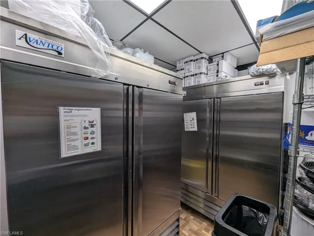 Commercial-grade stainless steel refrigeration units, featuring top-mounted compressors and a durable finish