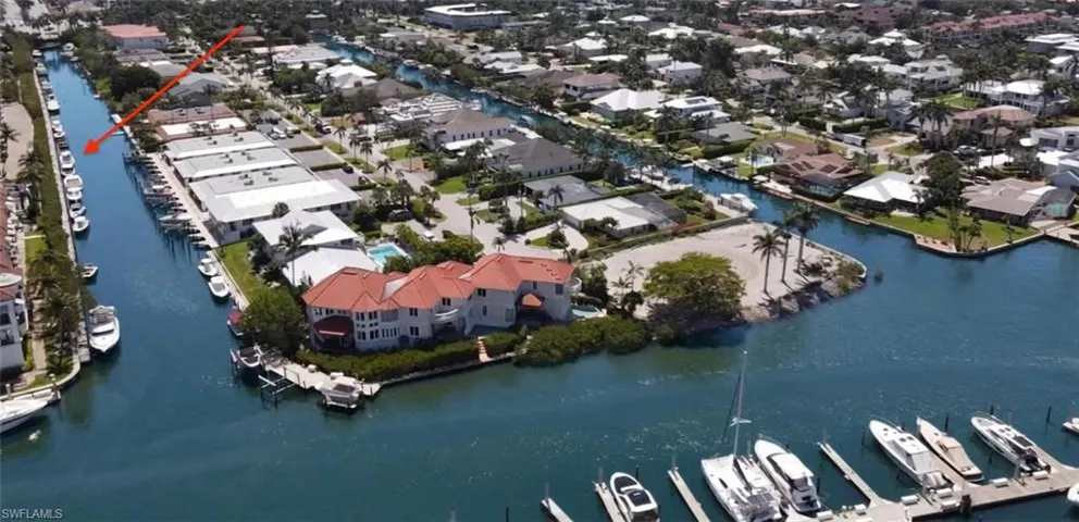 Aerial view of a Curlew Canal leading out to Naples Bay