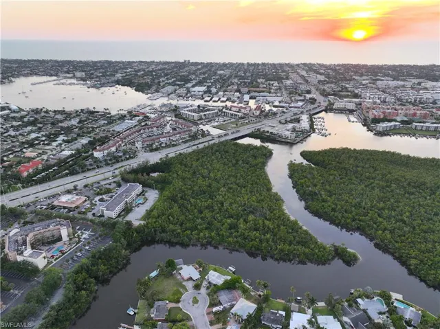 Aerial view at dusk with a water view