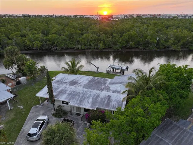Aerial view at dusk with a water view