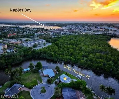 Aerial view at dusk with a water view