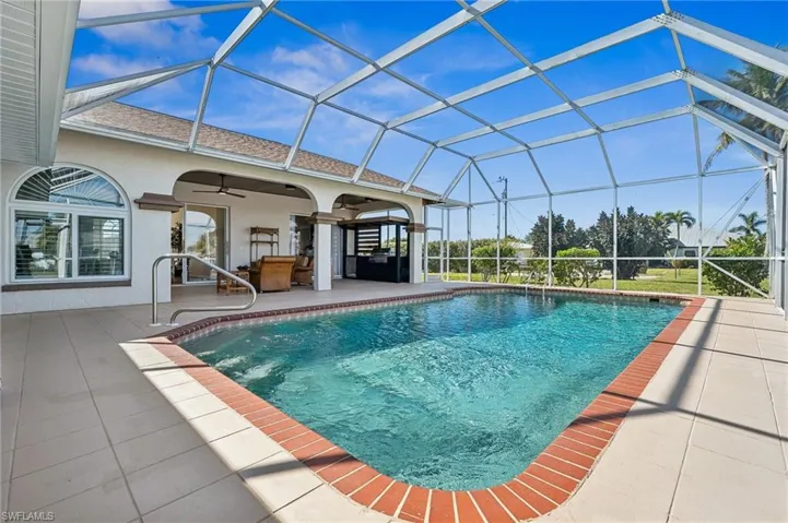 Host guests in style with a custom grilling station and spacious patio.