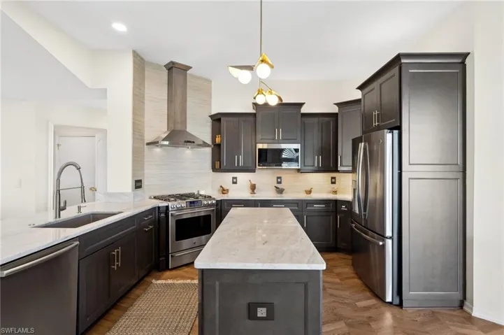 Gourmet Kitchen with Luxury Touches – High-end finishes, gas range, and soft-close cabinetry
