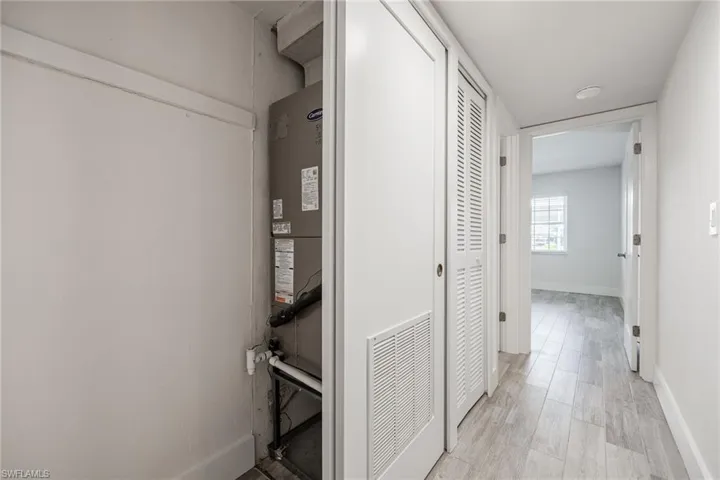 Hallway closet with new air conditioner