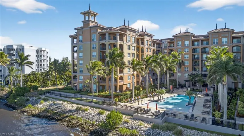 Rear sideview of complex featuring the community pool