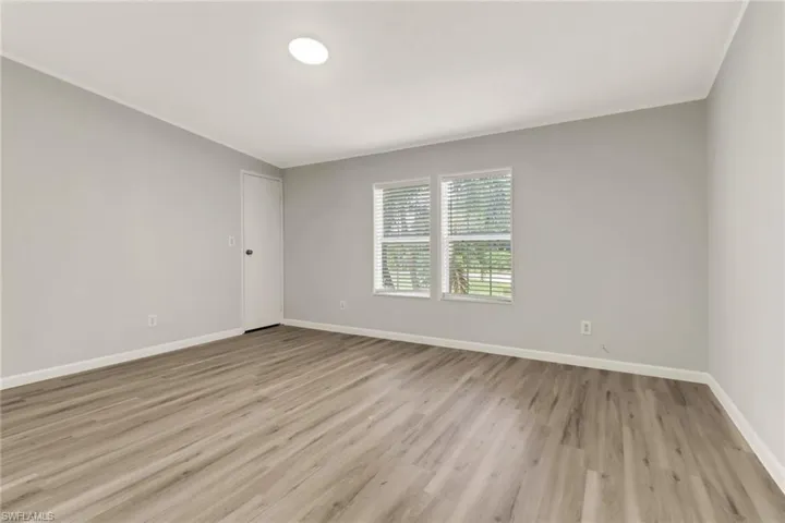 Empty room featuring light hardwood / wood-style floors
