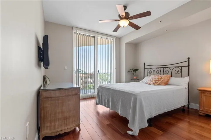 Guest bedroom with sliders to the balcony