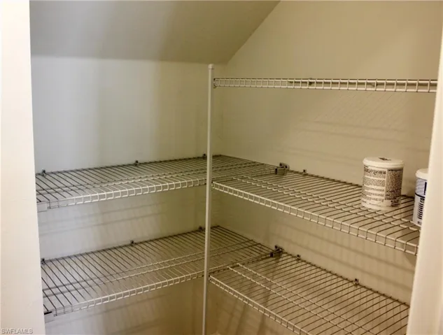 Integrated wire shelving system with multiple tiers, offering extensive storage capacity