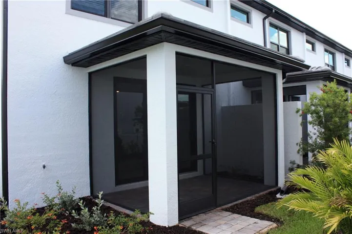 Outdoor view of screened in patio