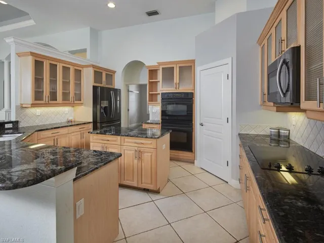 Natural wood cabinets create a warm and inviting ambiance.