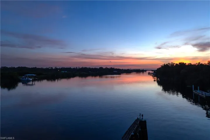 Water view with a boat dock